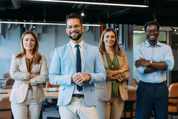 istock Confident businessman and his team. 2169869981