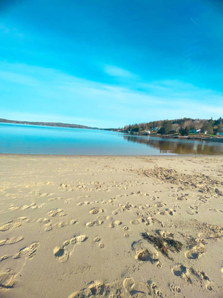 Coastal Aerial View Along Highway 138 in Cote Nord Region, Quebec, Canada During Summer. An empty beach along the St. Lawrence river showing beautiful landscapes.