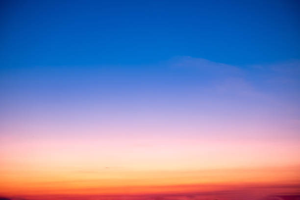istock Beautiful , luxury soft gradient orange gold clouds and sunlight on the blue sky perfect for the background, take in everning,Twilight, Large size, high definition landscape photo 2169879151