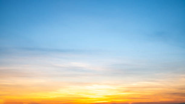 istock Beautiful , luxury soft gradient orange gold clouds and sunlight on the blue sky perfect for the background, take in everning,Twilight, Large size, high definition landscape photo 2169879161