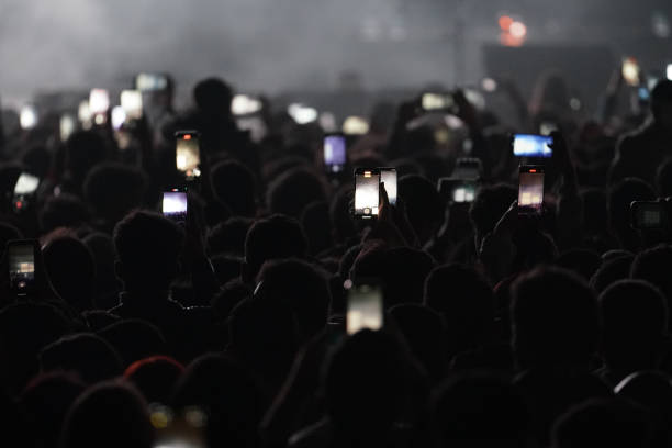 istock People are watching a concert 2169880571