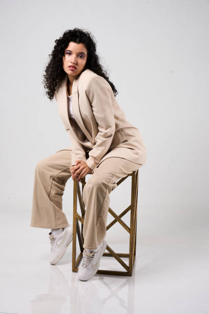 istock Elegant Pose In Studio On Chair 2169883807