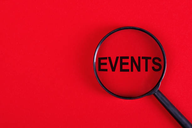 istock Magnifying glass with the inscription EVENTS on a red background. 2169887821