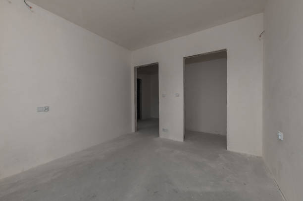istock A room in a new, unfinished apartment, empty plastered walls 2169890930
