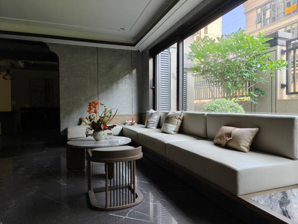 istock Light living room interior with couch and chairs, panoramic window. Mockup 2169894890