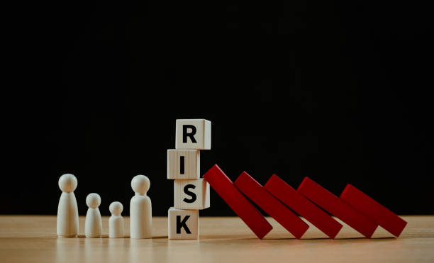 istock Risk management crisis analysis concept. Financial assessment solution, real estate loan business service. Insurance technology plan protect mortgage. House safety family life, red wood domino block 2169896715