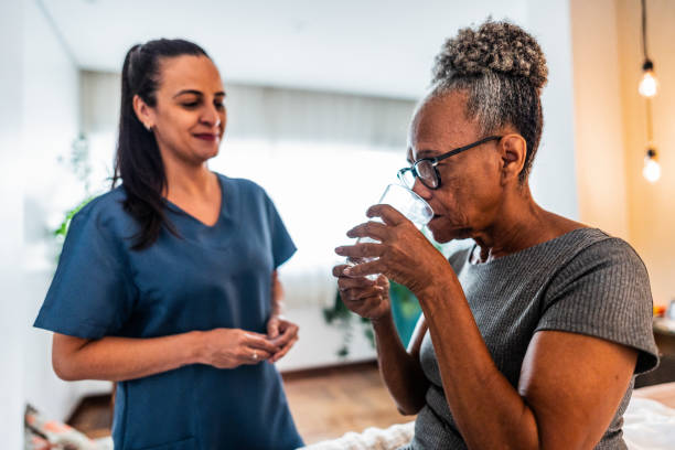 istock Patient taking medicine at home 2169900083