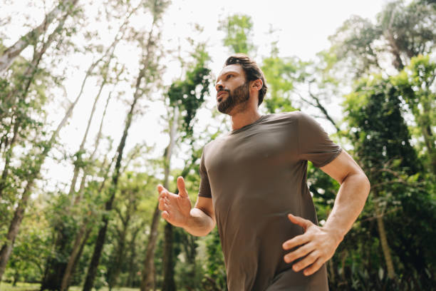 istock Mature man running at the park 2169901990