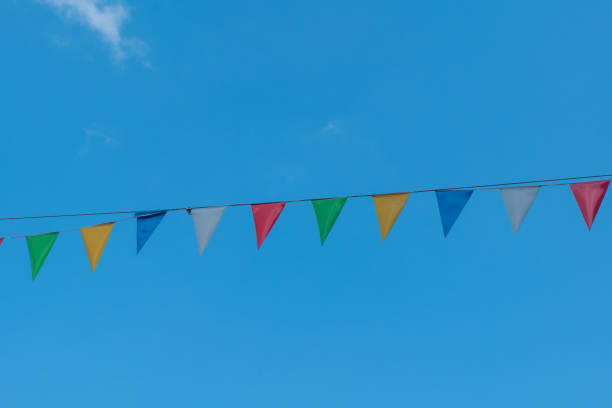 istock row of colorful flags are hanging from a wire 2169903704