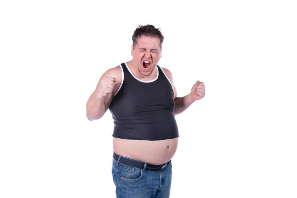 istock Funny fat man on a diet. Guy posing on a white background. 2169904289