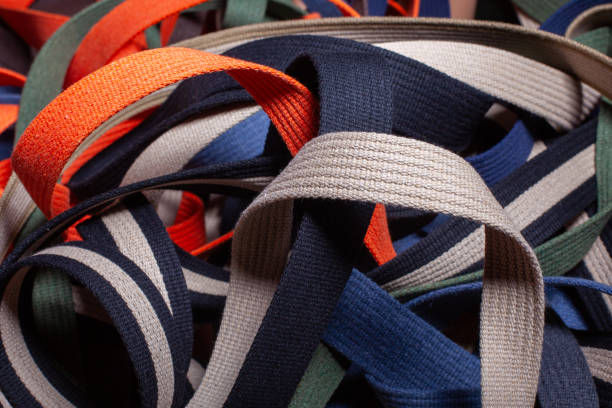 istock Colorful Woven Fabric Straps in a Tangled Pile 2169904654