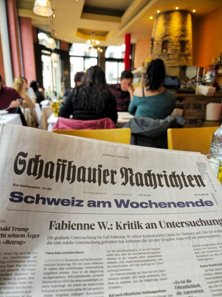 Stack Of Newspapers On Table