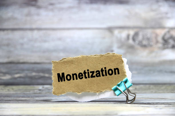 istock Monetization wording or text on brown paper with grey background.Copy space and business concept. 2169907103