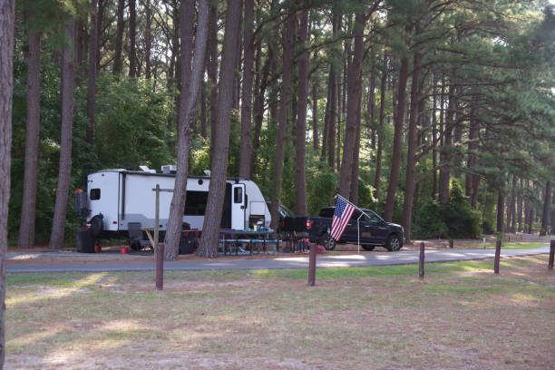 RV camper with American flag  in Janes Island State Park in Crisfield, MD