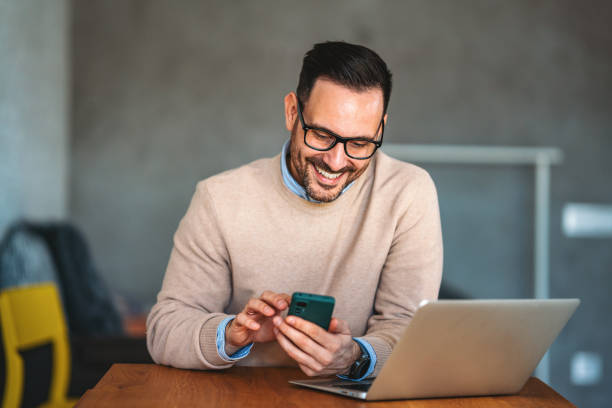 istock Business man working on laptop at home office. Remote teacher, remote studying, virtual training. 2169909169