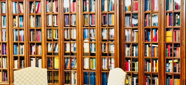 istock Book shelves behind glass 2169909972