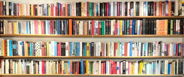 Four long wooden Book shelves