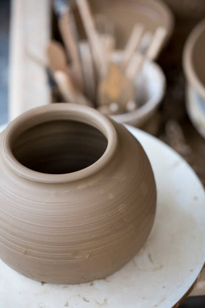istock Pottery art in process on a potters wheel 2169915115
