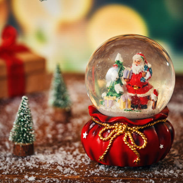 istock Christmas Decoration with Snow Globe and Holiday Lights 2169917628