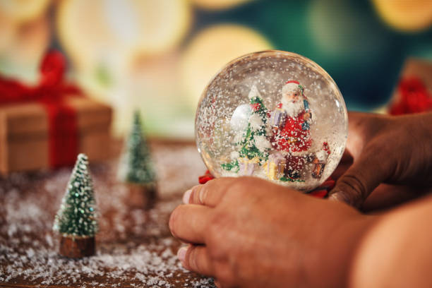 istock Christmas Decoration with Snow Globe and Holiday Lights 2169917665