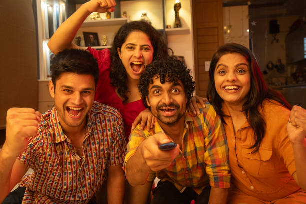 istock Friends watching match and enjoying weekend at home 2169918063