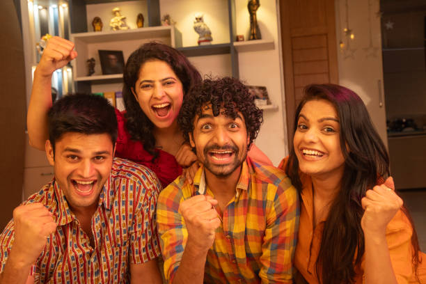 istock Happy friends enjoying at home during weekend 2169918146