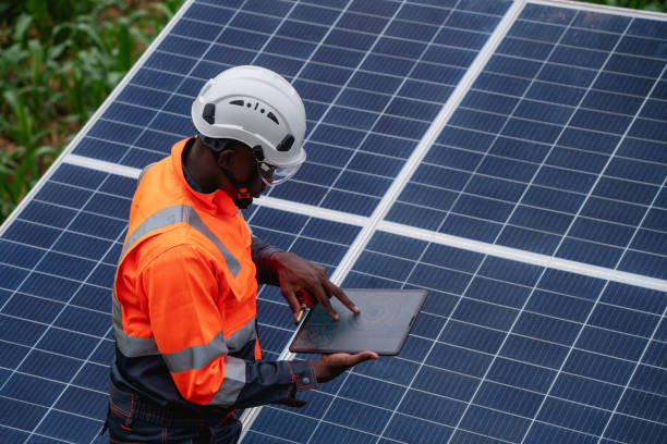istock Service engineer inspects and maintains solar panels in a cultivation area, promoting clean energy. 2169919841