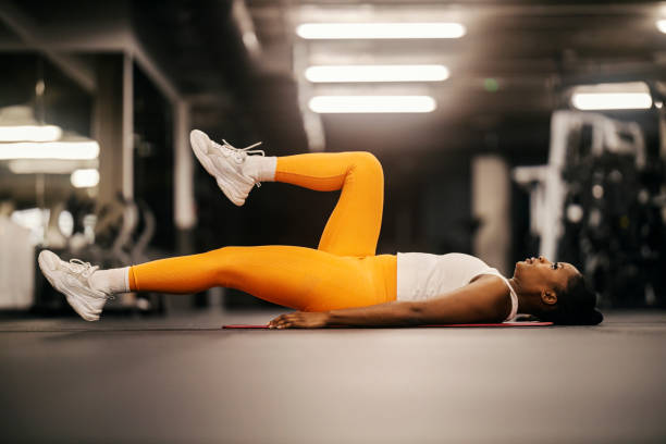 istock A fit black sportswoman doing crunches at the gym. 2169920896