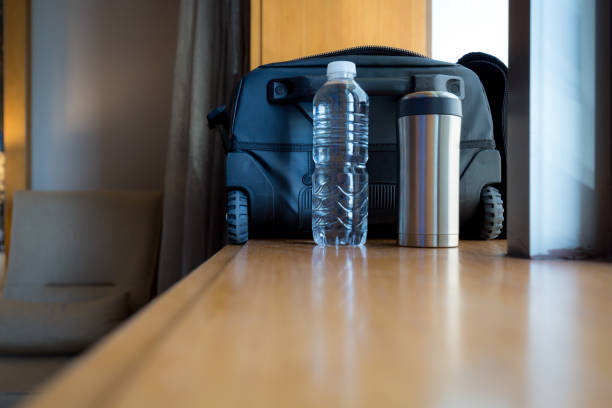 istock Open suitcase by the window ready for the journey 2169923950
