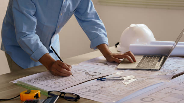 architectural and engineering concept. collaboration and strategy for construction. building, planning and civil engineering team in workshop with paperwork for project management. - i̇nşaat sanayisi stok fotoğraflar ve resimler