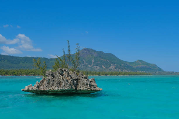 Crystal Rock surrounded by turquoise water