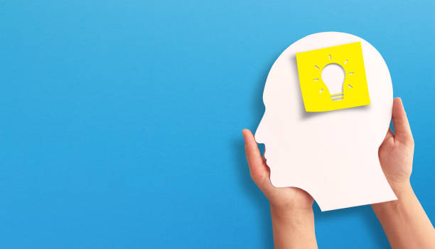 istock Big idea, inspiration concept. Note paper with light bulb inside human head on blue background. 2169933352