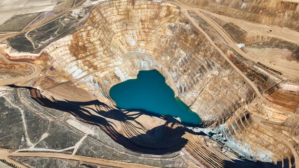 istock Terraced Gold Mine with Water Pool 2169935470