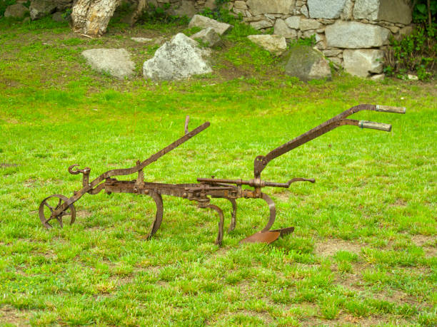 istock old plow placed as an ornament in a garden 2169935886