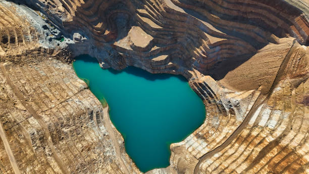 istock Water-Filled Basin in a Gold Mine 2169936249