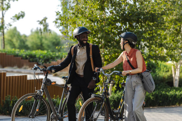 istock Business professionals commuting by bicycle on a sunny day 2169944973