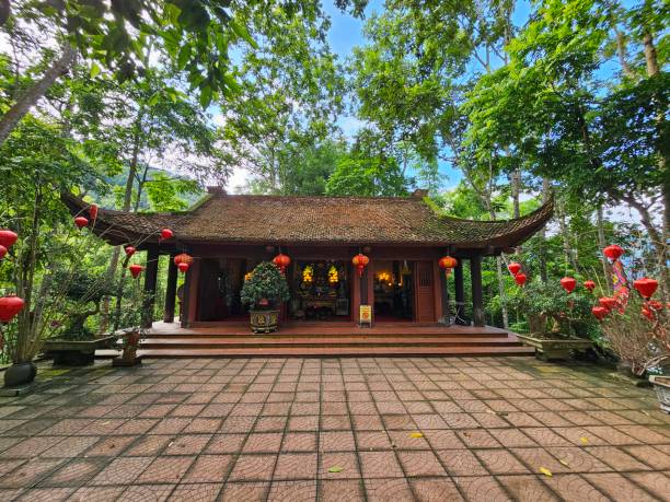 istock Traditional Forest Temple with Red Lanterns and Tranquil Ambiance 2169945668