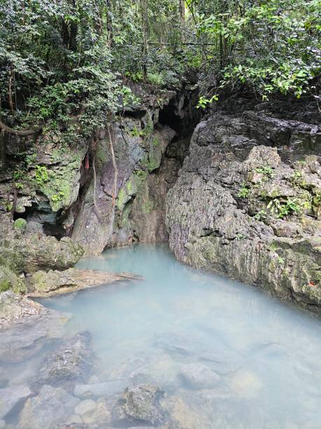 istock Secluded Natural Spring Amidst Rugged Rock Formations 2169945743