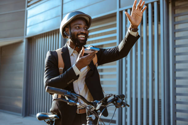 istock African American businessman commuting on bicycle while talking on the phone 2169945986