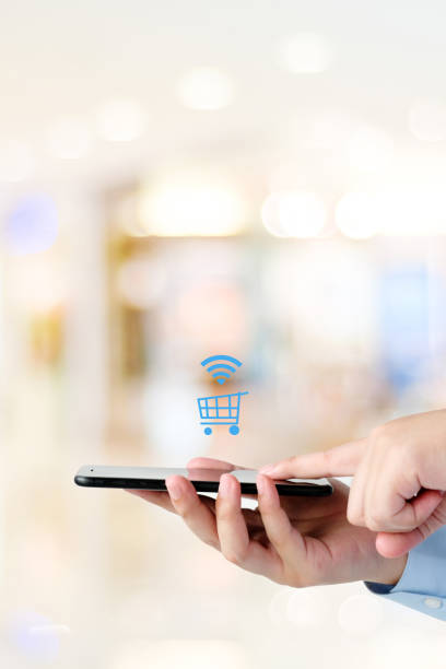 istock Online shop on mobile phone, Hand using smartphone for shopping electronic store online, digital marketing, e commerce business concept 2169948250