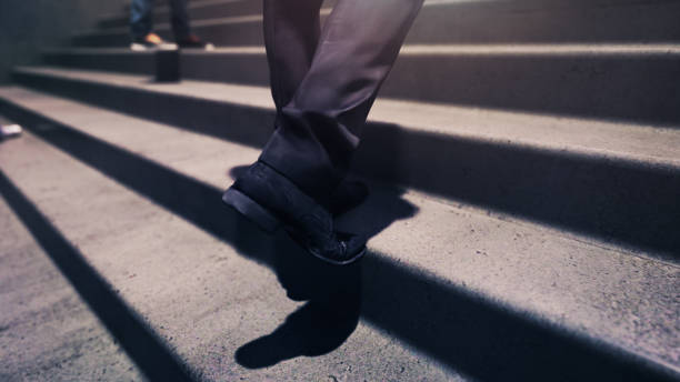 istock Businessman Climbing Stairs Close-up, New Beginnings Concept 2169949362