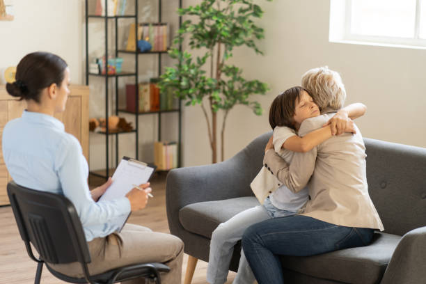 istock Parent and child in therapy session with a psychologist 2169950776
