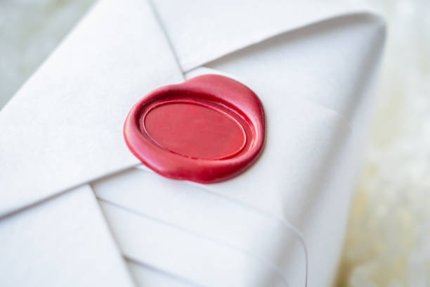 Wax seal stamp on white paper wrap packaging parcel box
