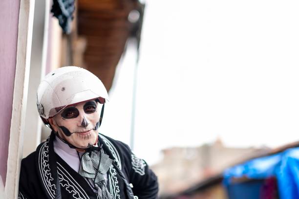 Man with helmet painted as a catrin