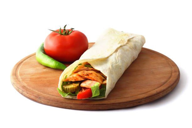 istock Doner kebab or shawarma sandwich isolated on white background 2169962541