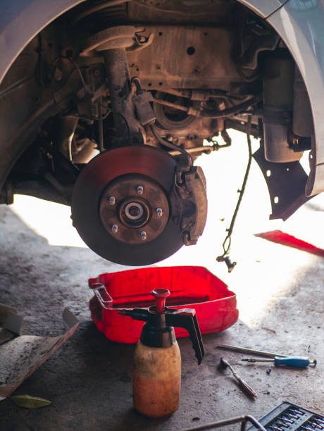 istock Mechanic tools engineering equipment car auto repair shop with copy space. Blurred background mechanical service. Heavy screw grungy rusted wrenches dirty screwdriver object. Industrial hardware set 2169964817