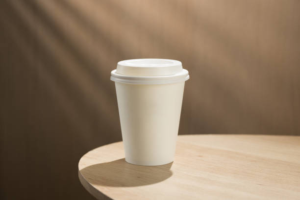 istock The solitary coffee cup on the wooden table. 2169965244