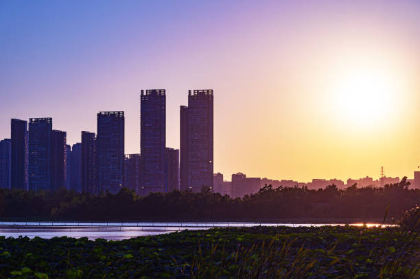 istock Twilight background of sunset over the modern urban skyline 2169967749