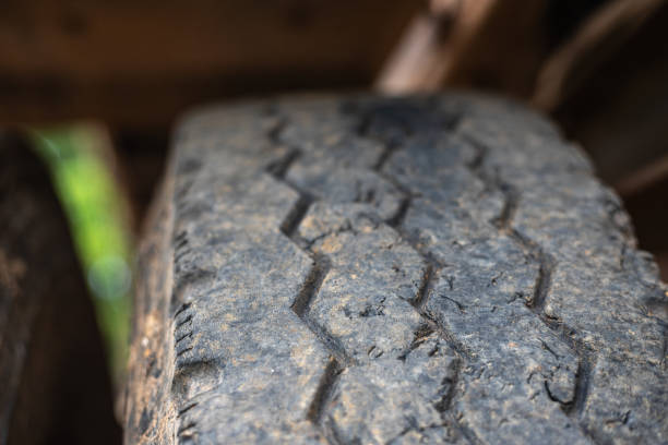 istock The tire is dirty and worn out. 2169968026