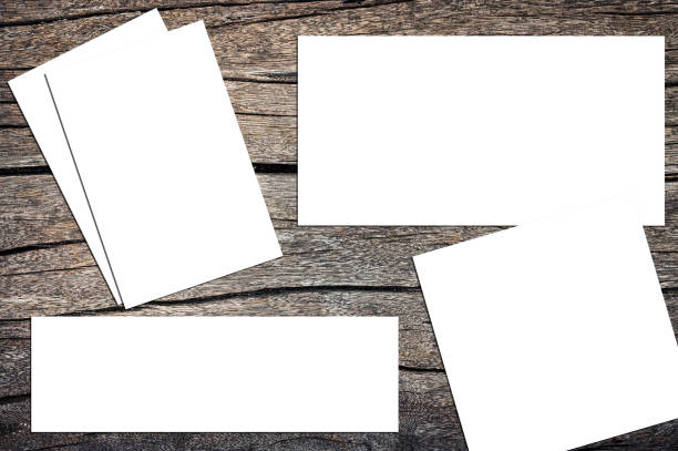 istock Blank paper cards  placed on the old wood plank 2169968297